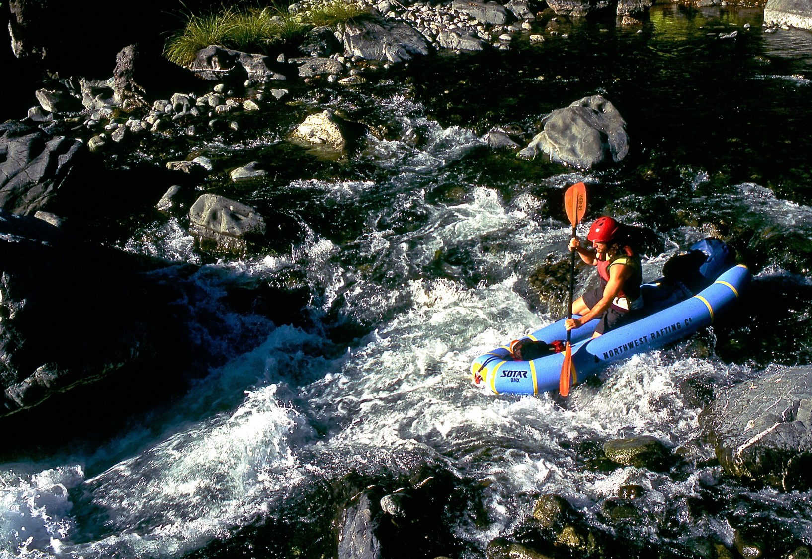 A photo of a kayaker on the Chetco River - Rogue River-Siskiyou National Forest